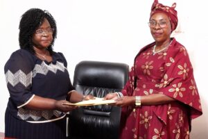 On the left, Espérance Ndayizeye takes office as the new boss of the CNC, replacing Vestine Nahimana on the right, DR