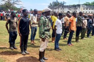 Imbonerakure and former CNDD-FDD fighters in a military parade in Rugombo in Cibitoke province (SOS Médias Burundi)
