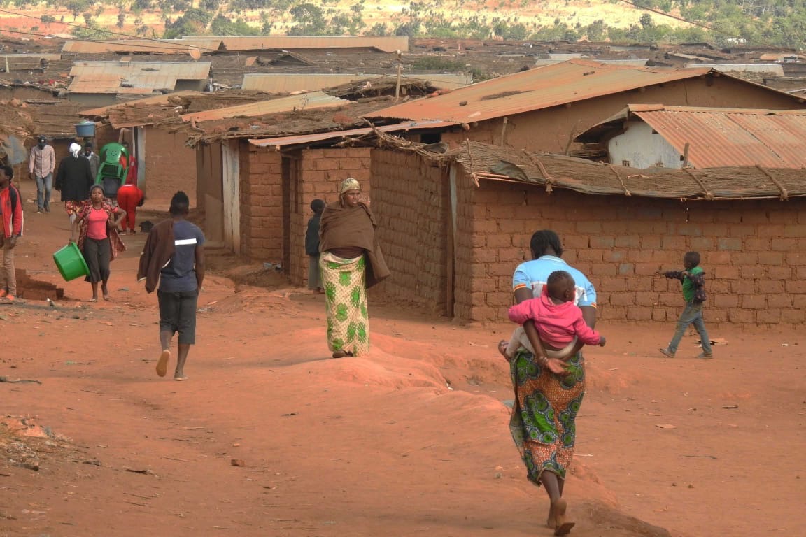 People walk inside Dzaleka camp in Dowa district in the central region of Malawi, June 20, 2018, DR